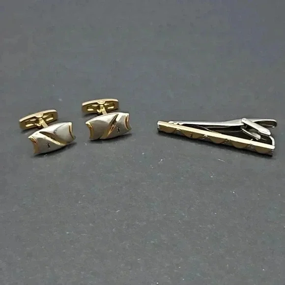 Yves Saint Laurent Gold and Silver Tone Cufflinks and Tie Bar set